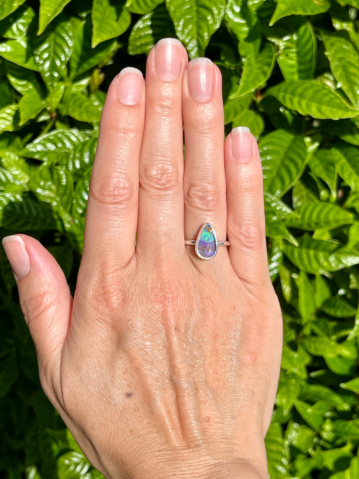 Wavy teardrop boulder opal ring