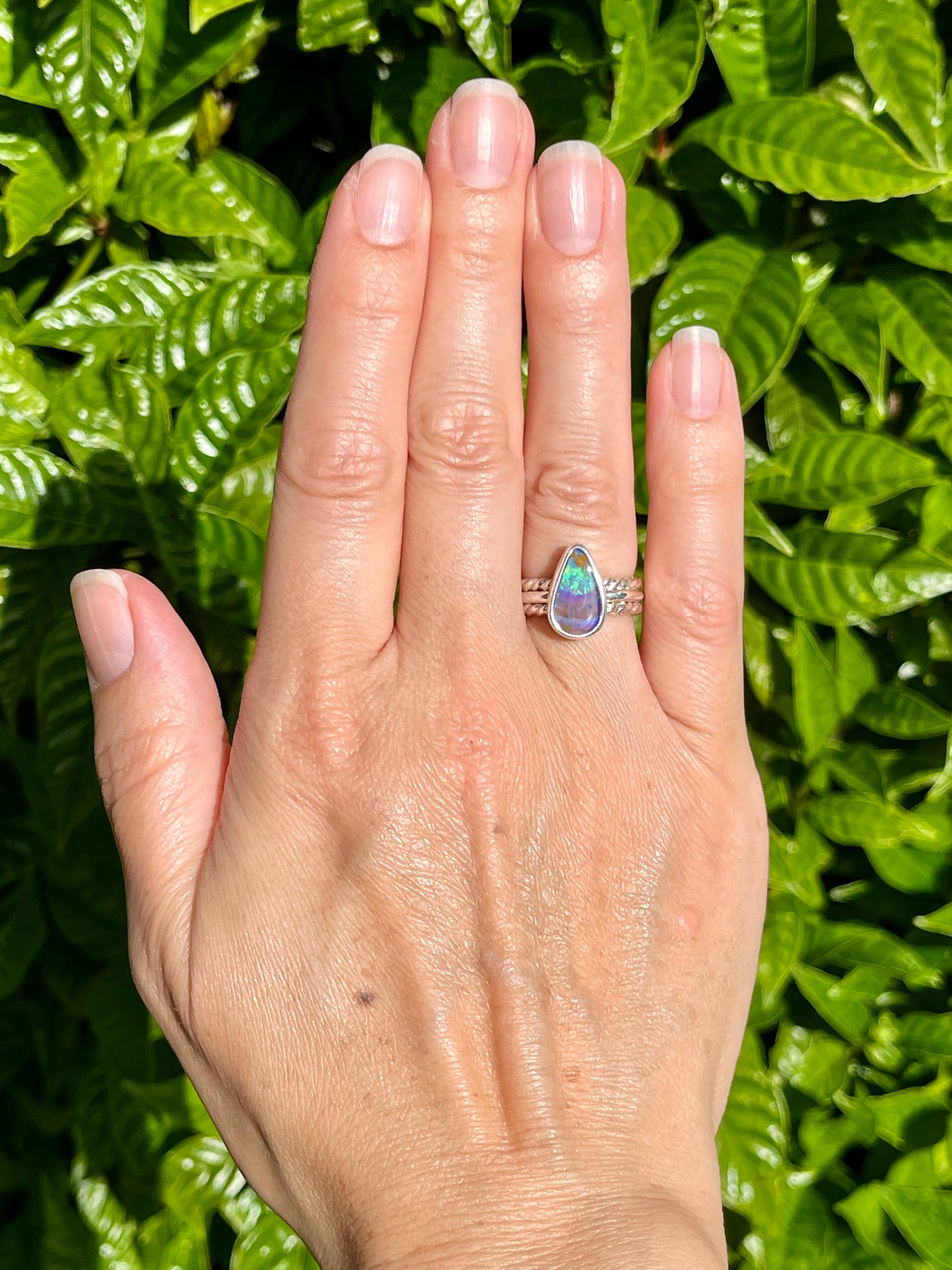 Wavy teardrop boulder opal ring